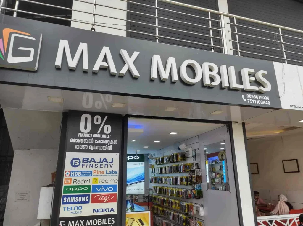 G MAX Mobiles store in Ottapalam displaying smartphones, mobile accessories, repair services, and finance options from leading smartphone brands.