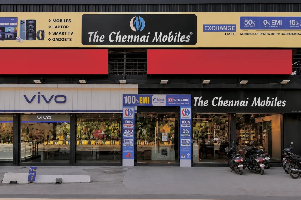 The Chennai Mobiles showroom in Ottapalam featuring smartphones, laptops, smart TVs, mobile accessories, exchange offers, and EMI facilities.